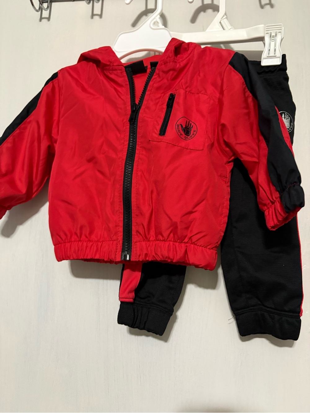 12M Body Glove track suit.
